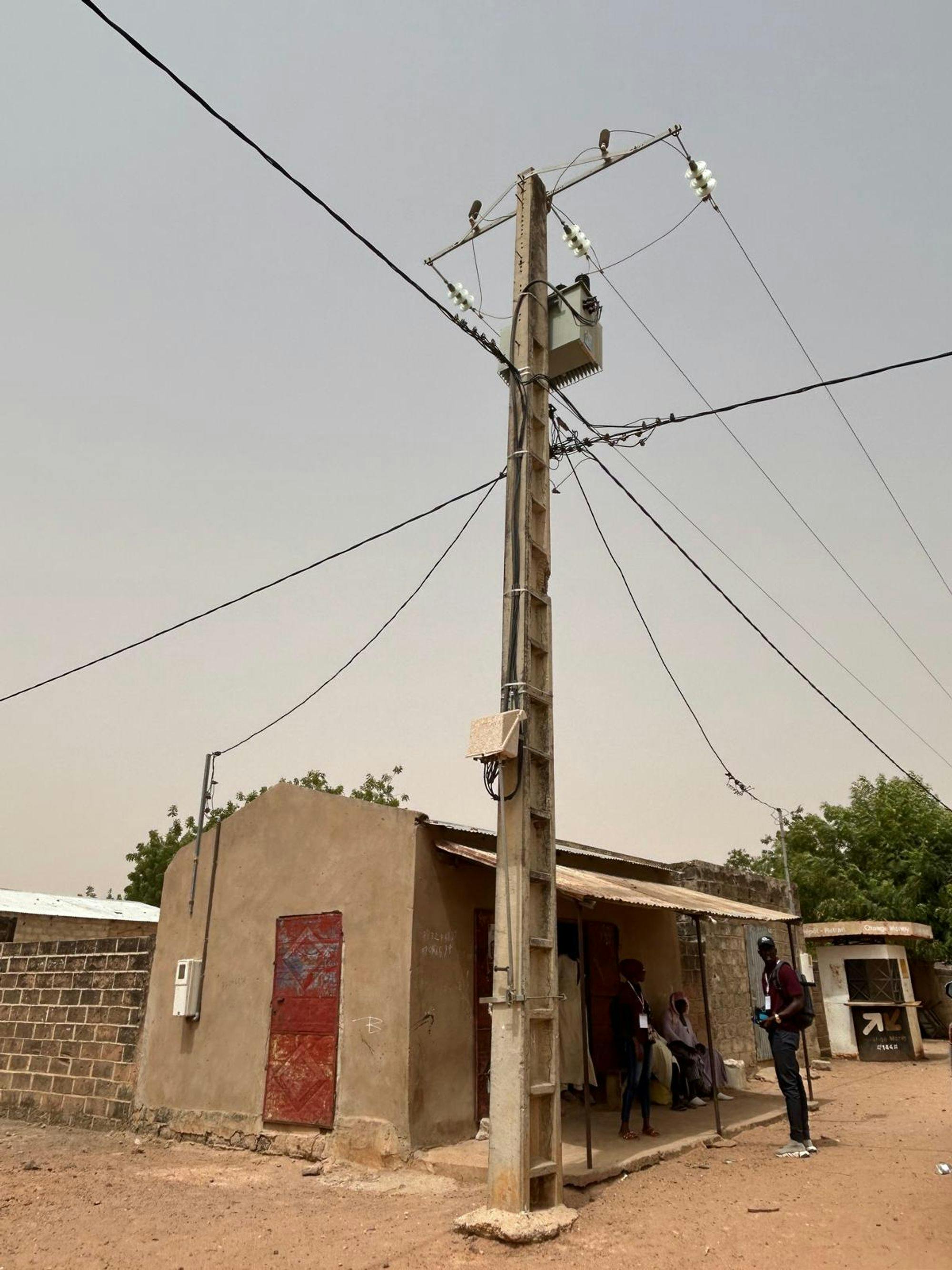 Using Transformer to Anchor Sensor Installations: Upon arrival in one of the 49 communities, the survey team located the transformer with nLine-provided GPS coordinates. Starting from the transformer, the three surveyors  then trace the lines and walk in three different directions (when possible) to find a grid-connected household and/or business nearest to the transformer who would be interested in participating in sensor data collection. 